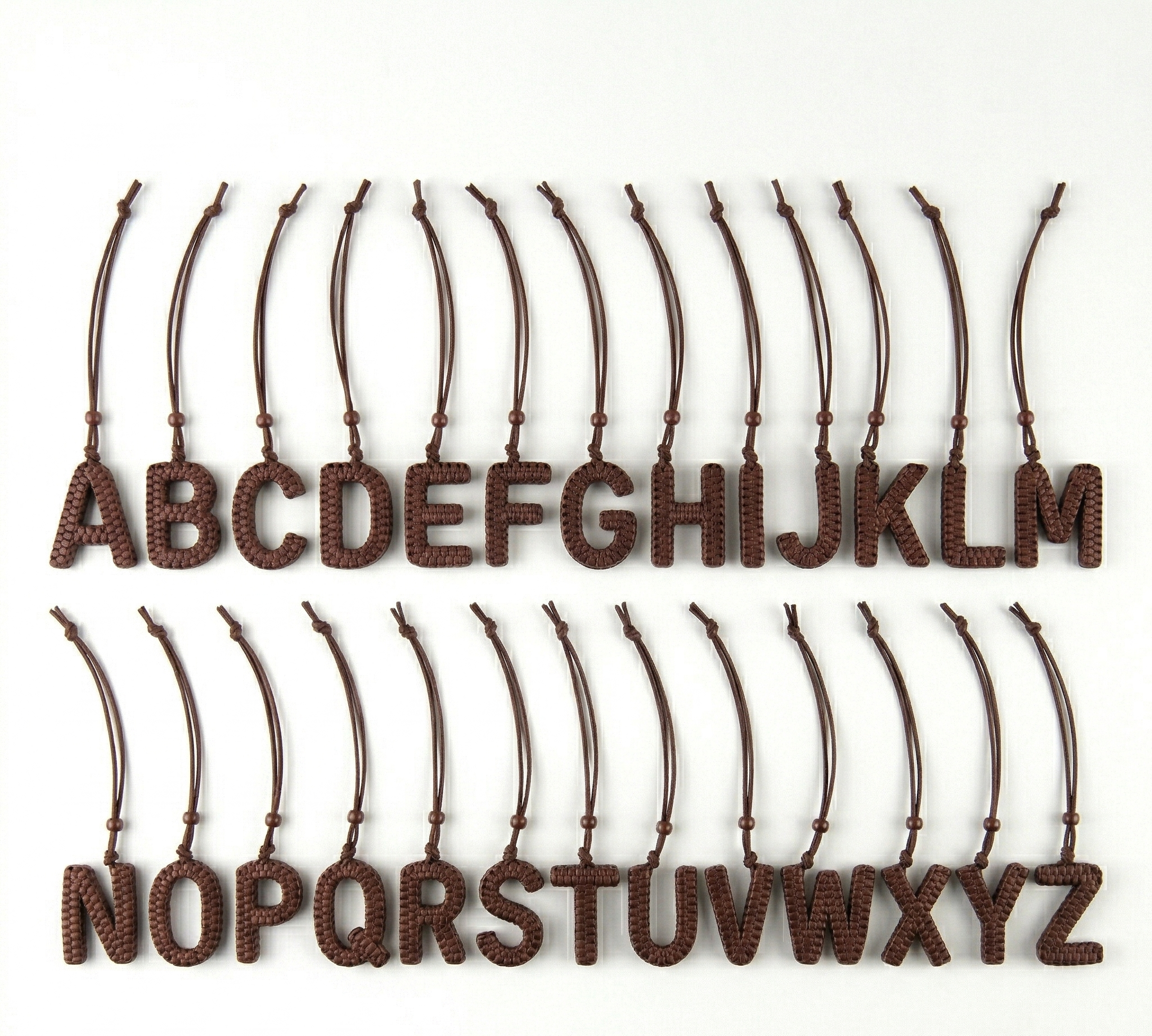 MONOGRAM LEATHER CHARMS